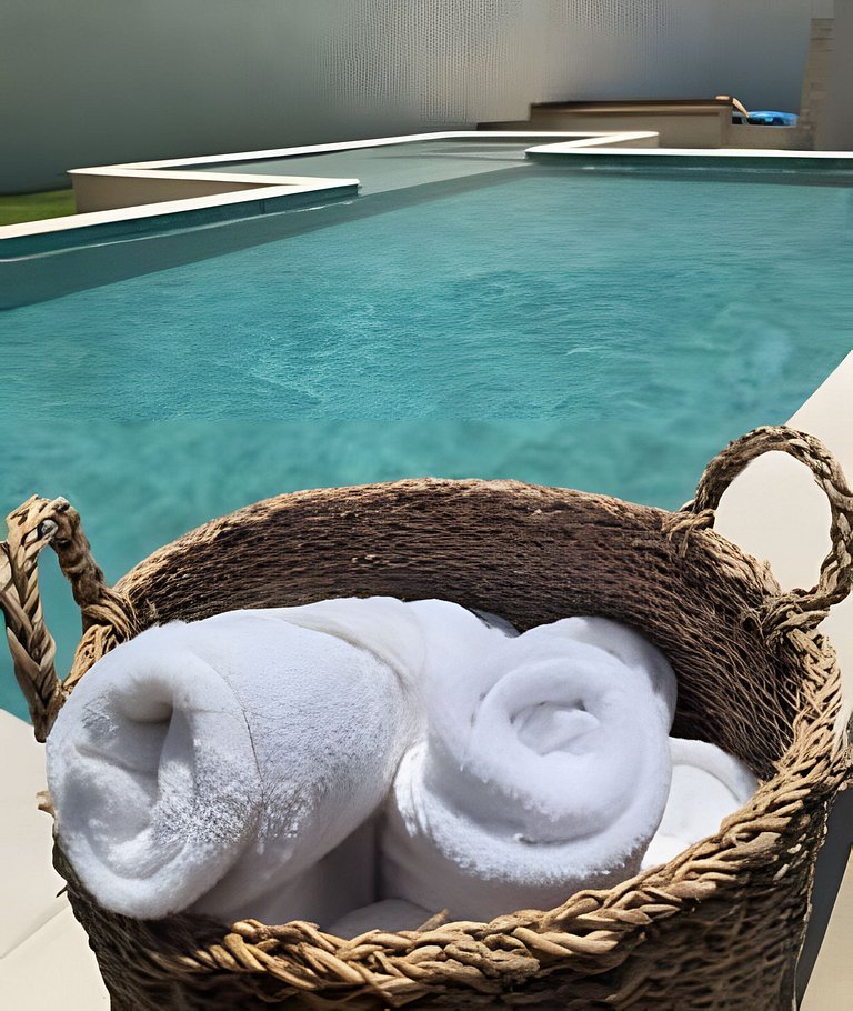 Casa sofisticada c/ 4 suítes, piscina e sauna