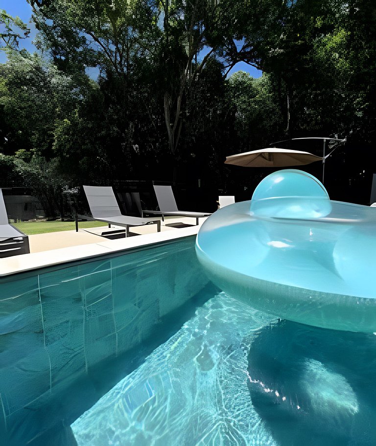 Casa sofisticada c/ 4 suítes, piscina e sauna
