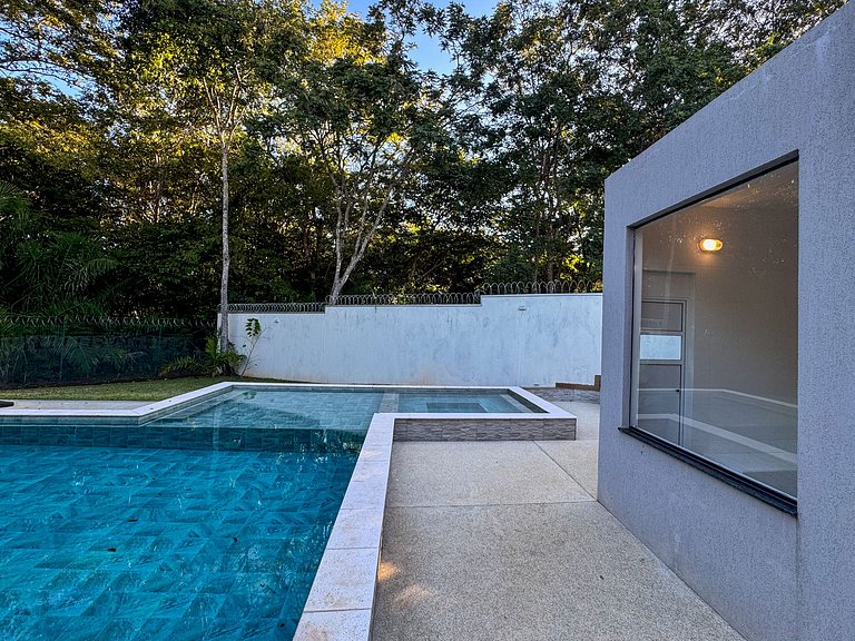 Casa sofisticada c/ 4 suítes, piscina e sauna