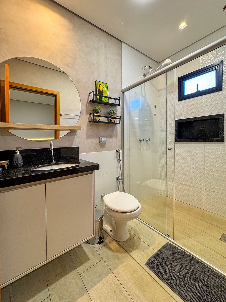 Casa sofisticada c/ 4 suítes, piscina e sauna