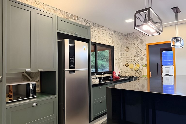 Casa Tuiuiú com 4 quartos e área gourmet em Bonito