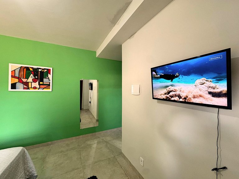 Suíte confortável com área de lazer e piscina